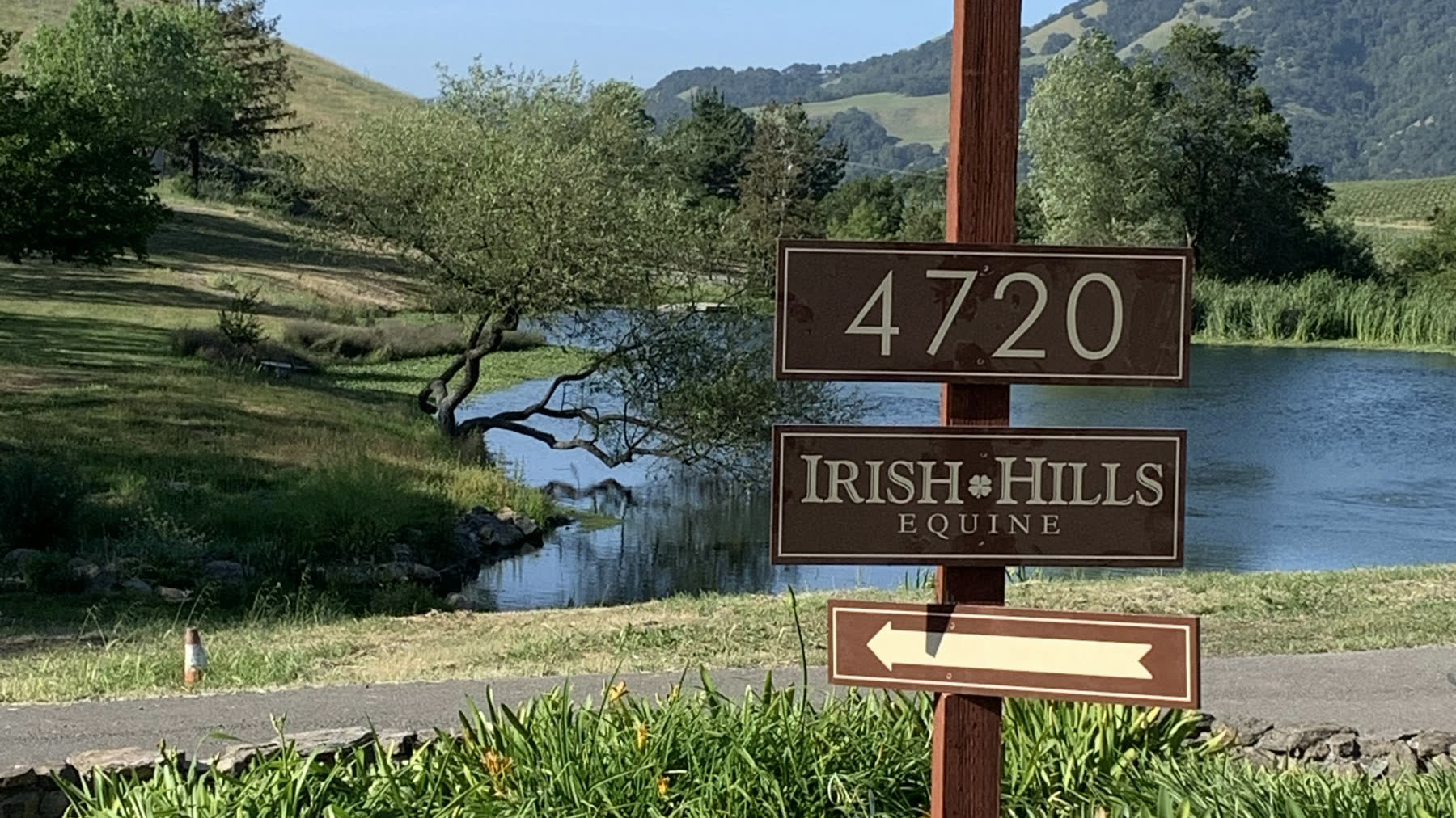 The Irish Hills Equine sign at the gate